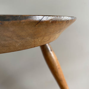 An Antique Ash Milking Stool with a beautifully aged deep and wide turned seat. Sitting on three cylindrically shaped legs. A beautiful piece and super solid - SHOP NOW - www.intovintage.co.uk