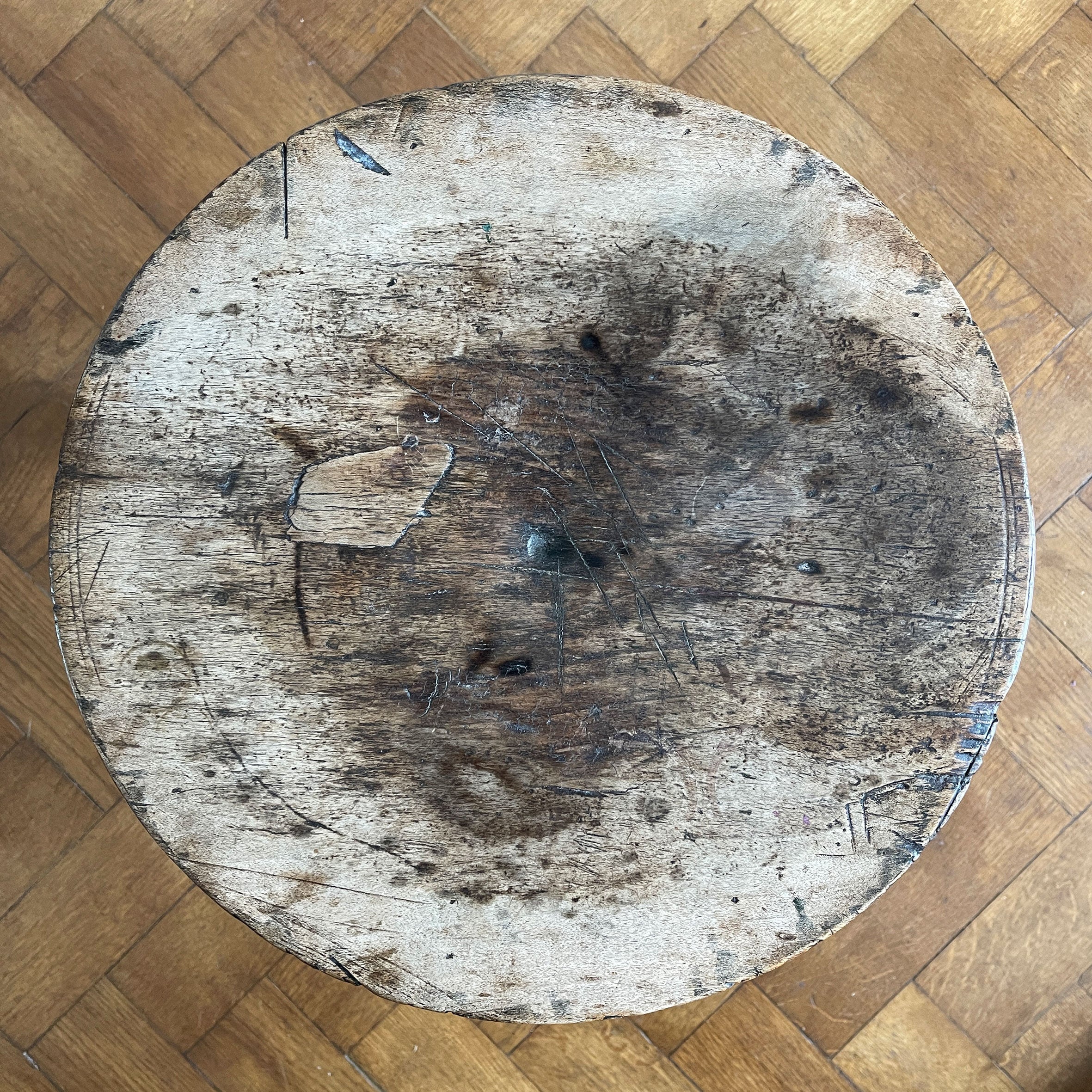 An Antique Ash Milking Stool with a beautifully aged deep and wide turned seat. Sitting on three cylindrically shaped legs. A beautiful piece and super solid - SHOP NOW - www.intovintage.co.uk