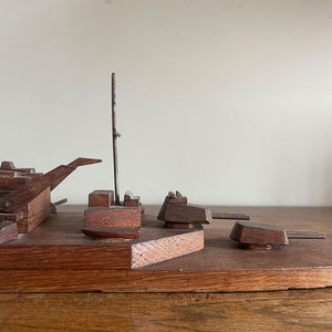 An 1940's vintage oak scratch-built battleship. Superbly built with perfect proportions, masts and fantastic rotating gun turrets. It has a flat bottom, so easy to display - SHOP NOW - Iintovintage.co.uk