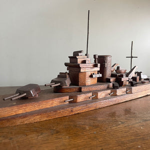 An 1940's vintage oak scratch-built battleship. Superbly built with perfect proportions, masts and fantastic rotating gun turrets. It has a flat bottom, so easy to display - SHOP NOW - Iintovintage.co.uk