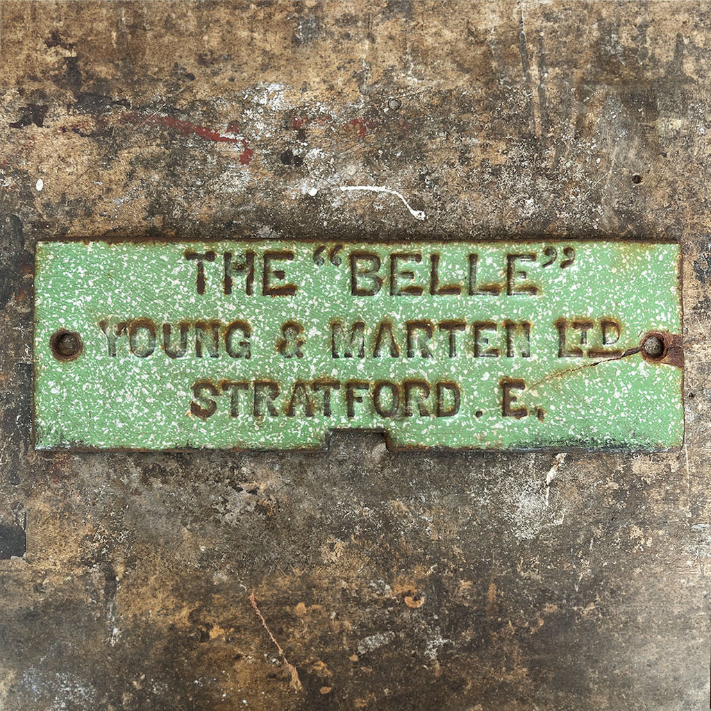 A cast and enamelled name plate from the firm Young & Martin Ltd with the legend 'THE "BELLE"'.  Young & Martin were a company based on The Broadway in Stratford East London. They specialised in supplying Lead Glass, Paper Hangings, Gas Fittings, Castings, Chimney-Pieces, Grates and Kitchens -SHOP NOW - www.intovintage.co.uk