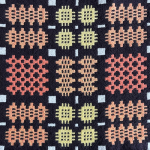 A pure wool Welsh Tapestry blanket in Black, Orange, Red, White and Yellow - SHOP NOW - www.intovintage.co.uk