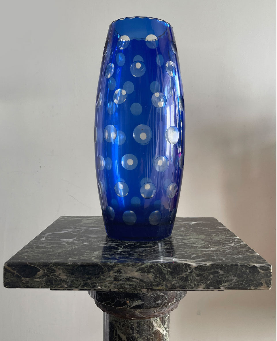 A stunning hand blown blue cased glass vase with hand ground spots catches the light beautifully. A flat bottom with hand-cut star keeps it nice and stable - SHOP NOW - www.intovintage.co.uk