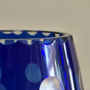 A stunning hand blown blue cased glass vase with hand ground spots catches the light beautifully. A flat bottom with hand-cut star keeps it nice and stable - SHOP NOW - www.intovintage.co.uk