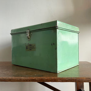 A Vintage Garrison Cake Tin in a fab duck egg green, and still having its 'CAKES' water slide sticker to the front. Open up the latch and find an inner tray that lifts out to reveal a larger space beneath - SHOP NOW - www.intovintage.co.uk