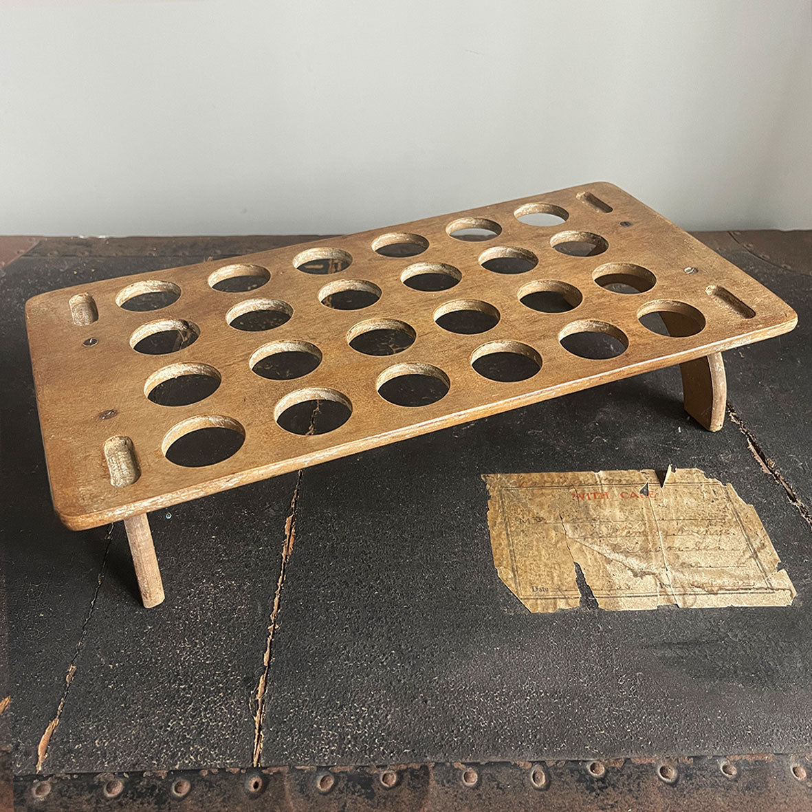 A late Victorian/Edwardian treen egg rack, dating from the late 1800s to early 1900s which can hold up to 24 eggs on a single tier. Simple in construction and in a primitive and rustic style - SHOP NOW - www.intovintage.co.uk