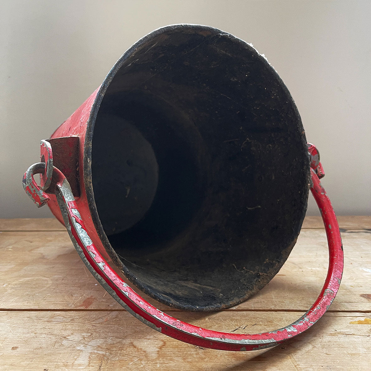 Vintage galvanised steel fire bucket with a wonderful distressed patina to it's red surface - SHOP NOW - www.intovintage.co.uk