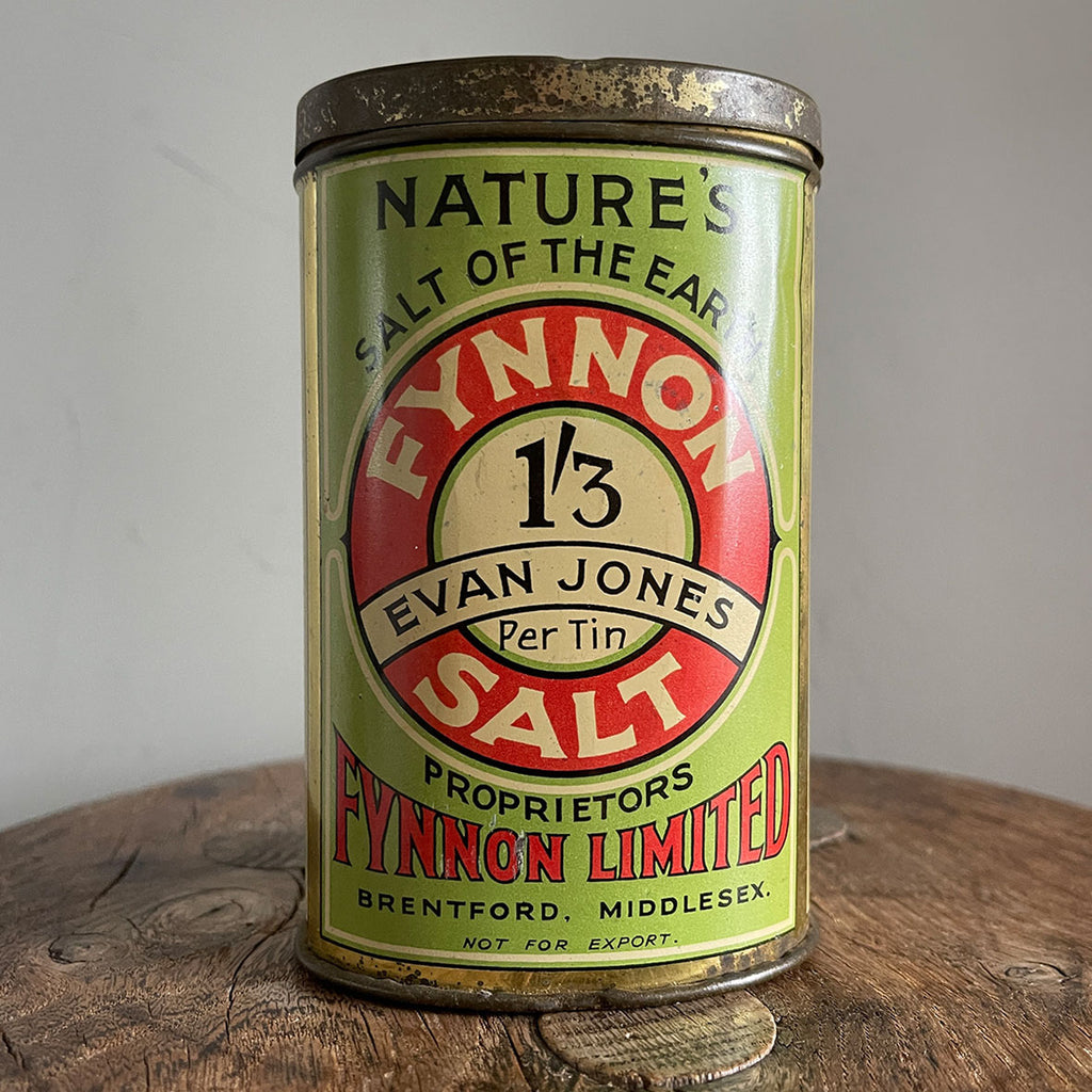 An Edwardian Fynnon Salt Tin. This tin would have held natural mineral salts, perfect for 'Over Fatness' 'Complexion' and 'Gout' amongst other remedies! Great design and typography - SHOP NOW - www.intovintage.co.uk