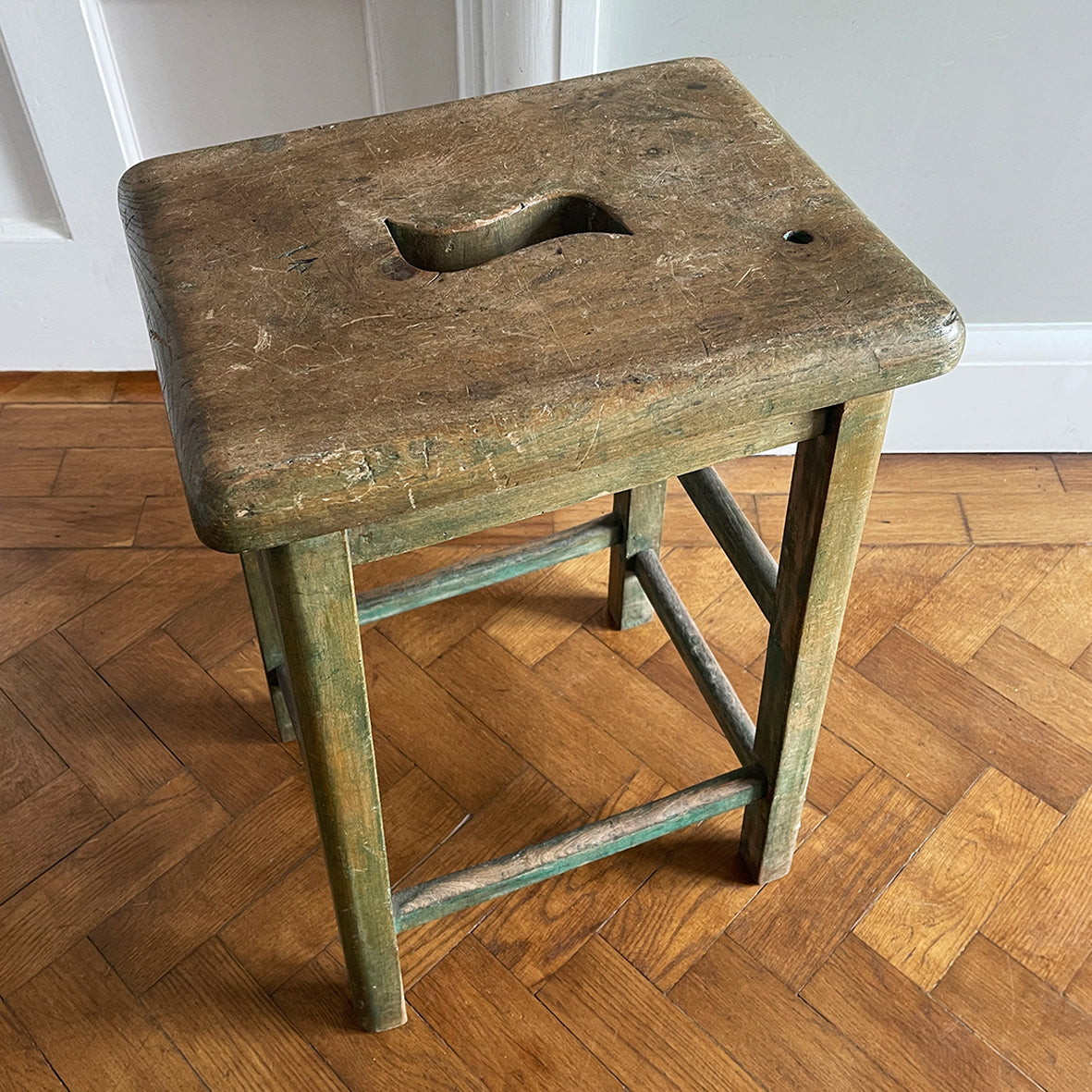 A vintage George VI stamped stool. Fantastic age related wear and patina yet still totally solid. The seat section has a cut in 'S' shaped handle - SHOP NOW - www.intovintage.co.uk