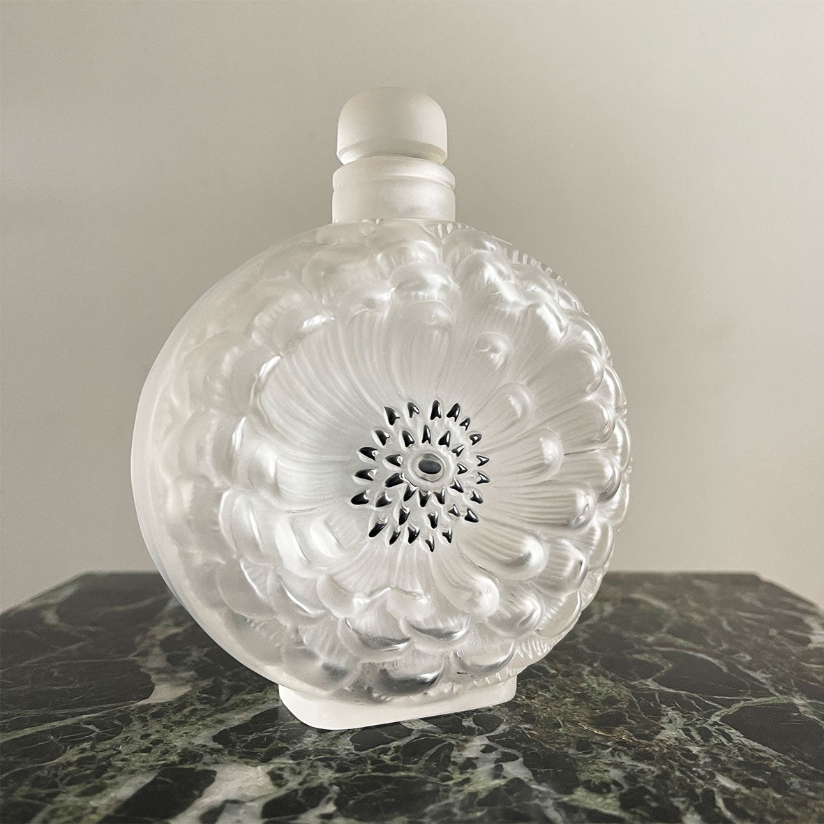 A beautiful late 20th C Lalique Dahlia scent bottle with original stopper. The words "Lalique France" are etched onto the base - SHOP NOW - www.intovintage.co.uk