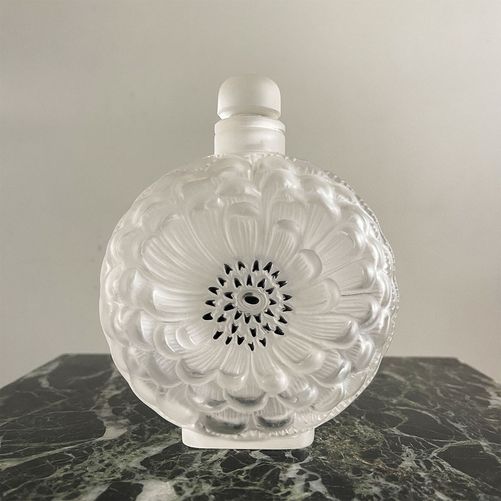 A beautiful late 20th C Lalique Dahlia scent bottle with original stopper. The words "Lalique France" are etched onto the base - SHOP NOW - www.intovintage.co.uk