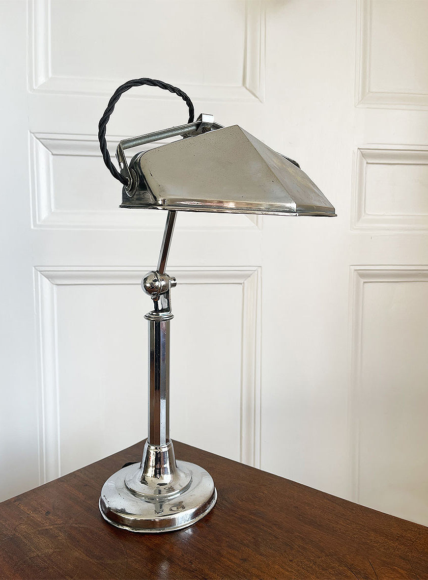 A smart looking nickel plated desk lamp from the Art Deco period. Fully adjustable head. Wired for electricity with new bayonet lamp fitting, three core black cloth covered cable new plug and pat tested - SHOP NOW - www.intovintage.co.uk