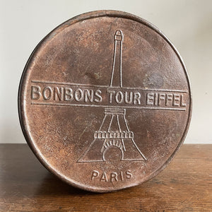 A large 1930s Tour Eiffel Bon Bon shop Tin by Pierrot Gourmand. Great embossed graphics to the lid - SHOP NOW - www.intovintage.co.uk