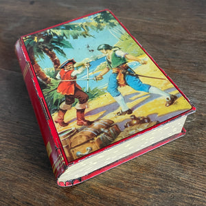 A Vintage 1950s Chad Valley Pirate Tin-Plate Money Box that looks like a book. With a cracking pirate image to the front and the word 'PIRATES' on the spine - SHOP NOW - www.intoVintage.co.uk