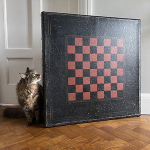 A Samson Folding Chess Table by Schwayder Brothers of Detroit. With a studded edge, metal corners and sturdy folding legs. It has a great aged look to it with original sales sticker underneath showing five gents standing on the table to showcase its strength, hence the name 'Samson'! SHOP NOW - www.intovintage.co.uk