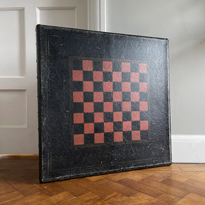 A Samson Folding Chess Table by Schwayder Brothers of Detroit. With a studded edge, metal corners and sturdy folding legs. It has a great aged look to it with original sales sticker underneath showing five gents standing on the table to showcase its strength, hence the name 'Samson'! SHOP NOW - www.intovintage.co.uk