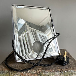 A stylish Art Deco Vanity Mirror that is lit from behind that creates a gorgeous soft defused light. The frame is nickel plated and has an electrical bulb fitting which has been re-wired with black vintage look cord flex - SHOP NOW - www.intovintage.co.uk