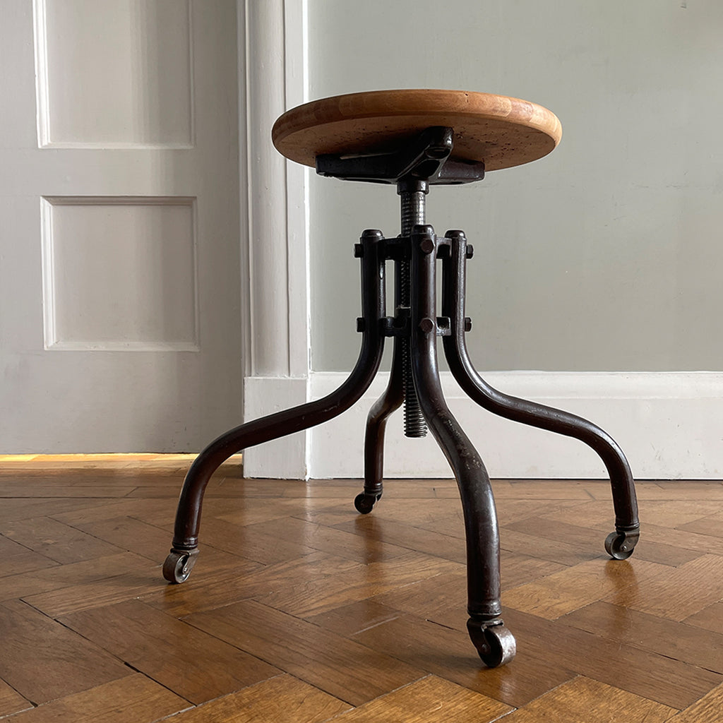 A Vintage Metal and Wood Stool set on dolly 4 wheels with an adjustable seat that when rotated adjusts the height of the seat.&nbsp; - SHOP NOW - www.intovintage.co.uk