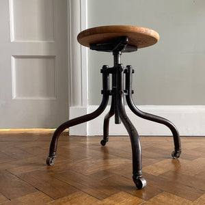 A Vintage Metal and Wood Stool set on dolly 4 wheels with an adjustable seat that when rotated adjusts the height of the seat.&nbsp; - SHOP NOW - www.intovintage.co.uk