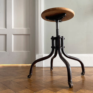 A Vintage Metal and Wood Stool set on dolly 4 wheels with an adjustable seat that when rotated adjusts the height of the seat.&nbsp; - SHOP NOW - www.intovintage.co.uk