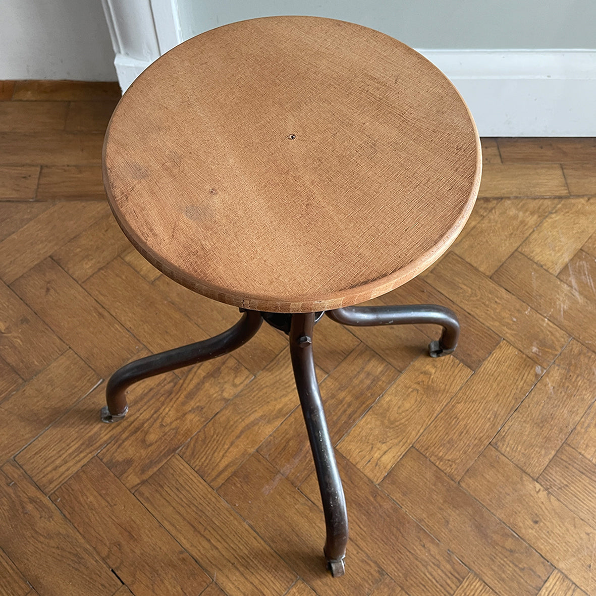 A Vintage Metal and Wood Stool set on dolly 4 wheels with an adjustable seat that when rotated adjusts the height of the seat.&nbsp; - SHOP NOW - www.intovintage.co.uk