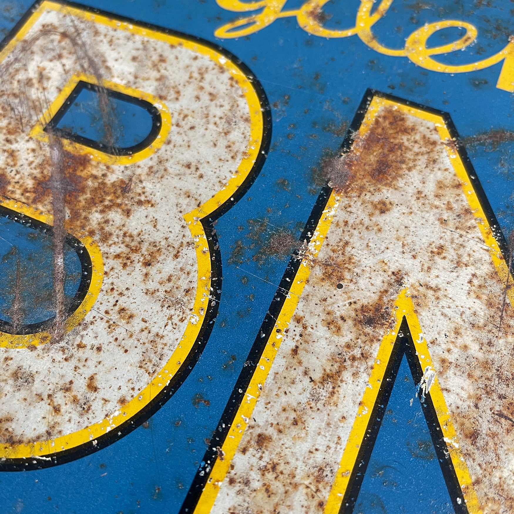A 1930s Ogden's Cob Nut Sliced Tobacco Tin Sign. In a fantastic bright blue with yellow and black highlights around white type.warm yellow with dark blue type. - SHOP NOW - www.intovintage.co.uk