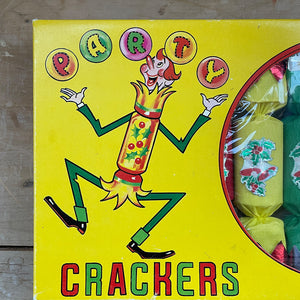 An original unused box of 1950’s Christmas Crackers. There are a total of X crackers in the brightly designed Jolly box, each with a snowman or holly & bells motif. Inside you’ll find an assortment of hats, novelties, together with mottoes and snaps - SHOP NOW - www.intovintage.co.uk