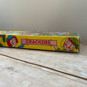 An original unused box of 1950’s Christmas Crackers. There are a total of X crackers in the brightly designed Jolly box, each with a snowman or holly & bells motif. Inside you’ll find an assortment of hats, novelties, together with mottoes and snaps - SHOP NOW - www.intovintage.co.uk