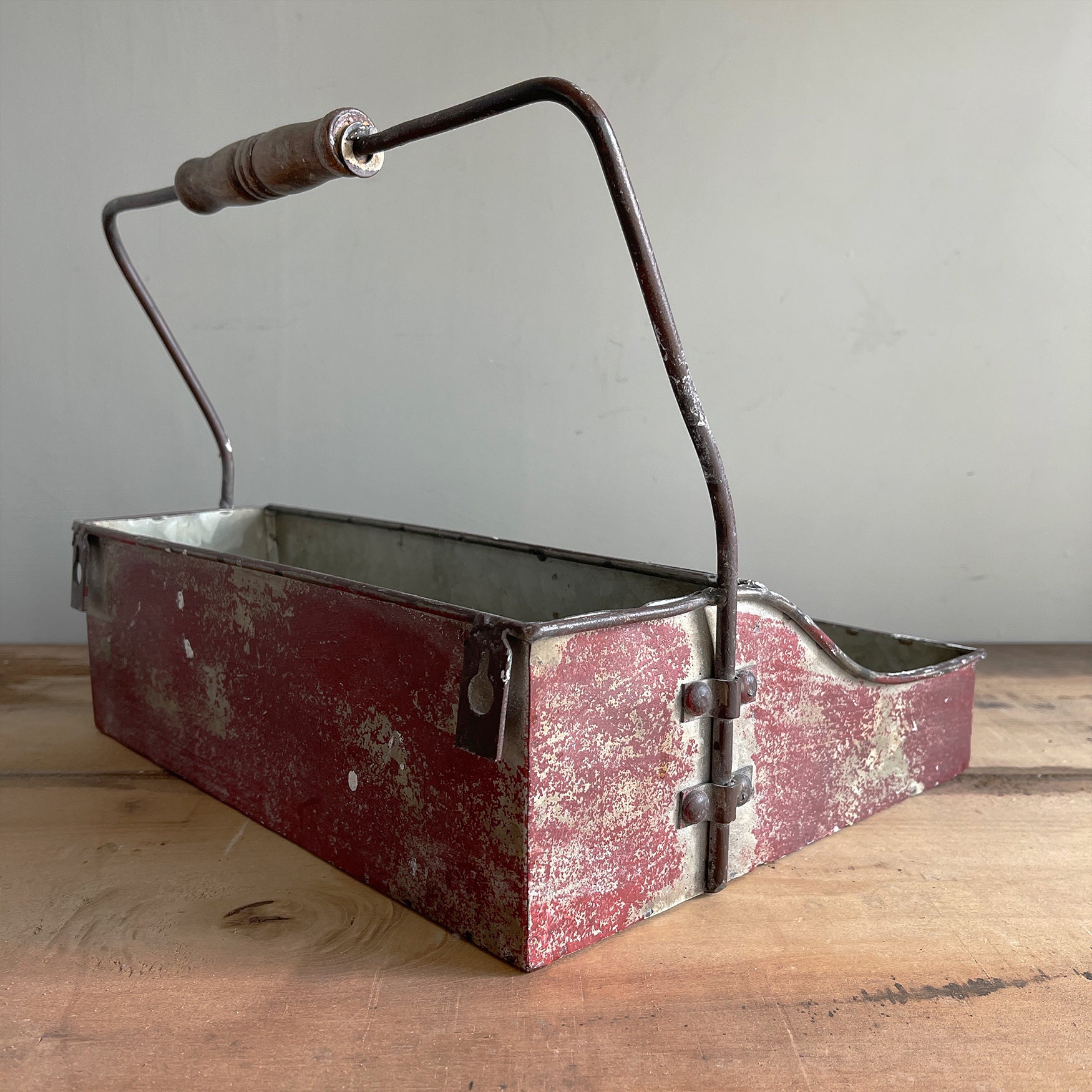 A practical Industrial Trug in an attractive time worn burgundy finish. The tray has four handy compartments ideal for keeping your condiments tidy on the dining table. Good looking and useful too - SHOP NOW - www.intovintage.co.uk