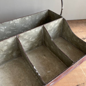 A practical Industrial Trug in an attractive time worn burgundy finish. The tray has four handy compartments ideal for keeping your condiments tidy on the dining table. Good looking and useful too - SHOP NOW - www.intovintage.co.uk