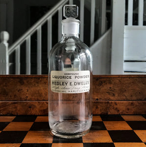 Vintage Clear Apothecary Bottle with an original paper label from Hedley E. Dwelly, High-Class Drug Stores, 41, Acton Lane, Harlesden. N.W. - SHOP NOW - www.intovintage.co.uk