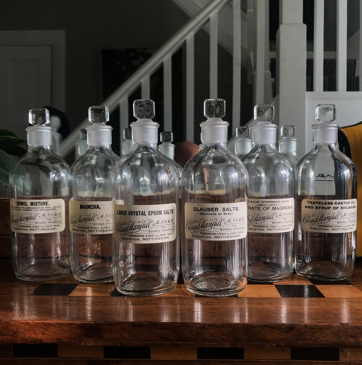 Set of Six Clear Apothecary Bottles with original paper labels from The Botanic Pharmacy, Thurgarton Street and Trent Road, Nottingham - SHOP NOW - www.intovintage.co.uk