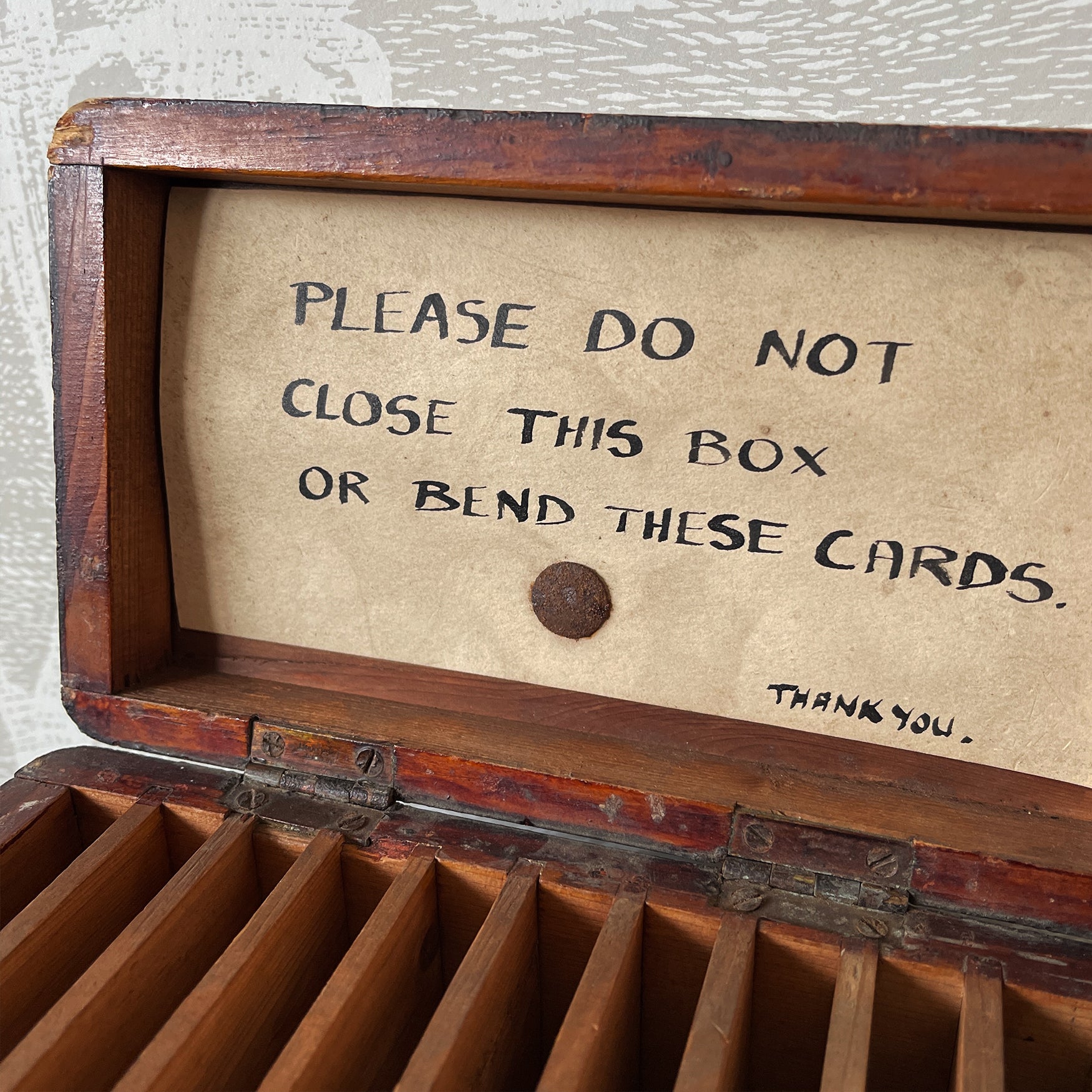 You have been warned! Do not close this box or bend the cards!!! With numbers from 1 to 10 painted in front of the slats along the front, we are not too sure what these or this curious box was used for but it's charming none the less - SHOP NOW - www.intovintage.co.uk