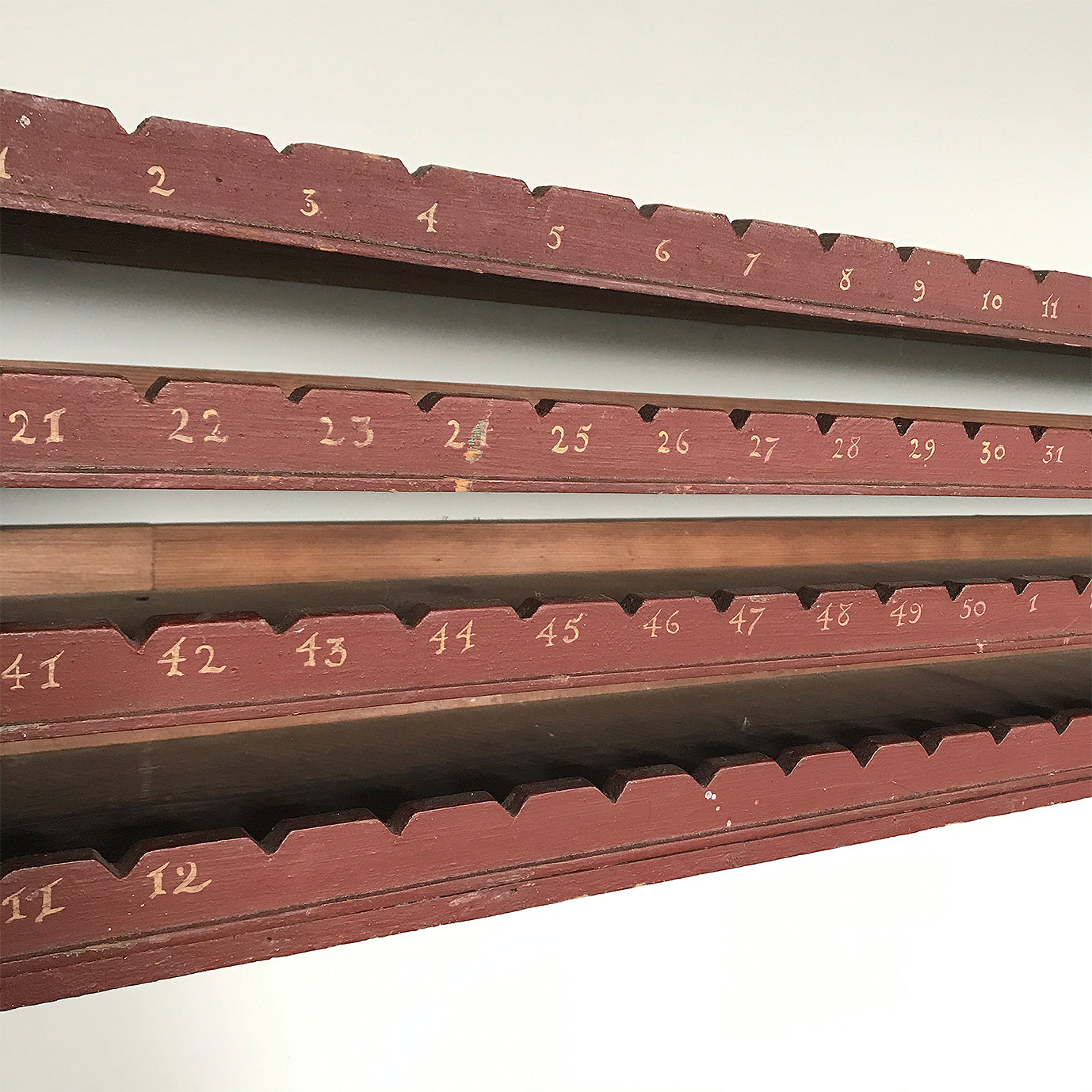 Late Victorian rack/shelf finished in a beautiful, original dark brick red paint with wonderful golden numbers hand painted on the front. It's scratch built from pine with each of the four shelves having 'V' shaped notches cut in above the numbers - SHOP NOW - www.intovintage.co.uk