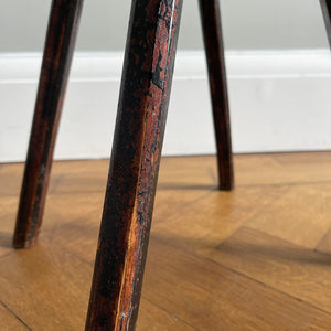 An Antique Elm Milking Stool with a wonder original black painted finish that has worn away over its years of use to provide the perfect finish. Very solid and sitting on four tapered straight edged legs -SHOP NOW - www.intovintage.co.uk