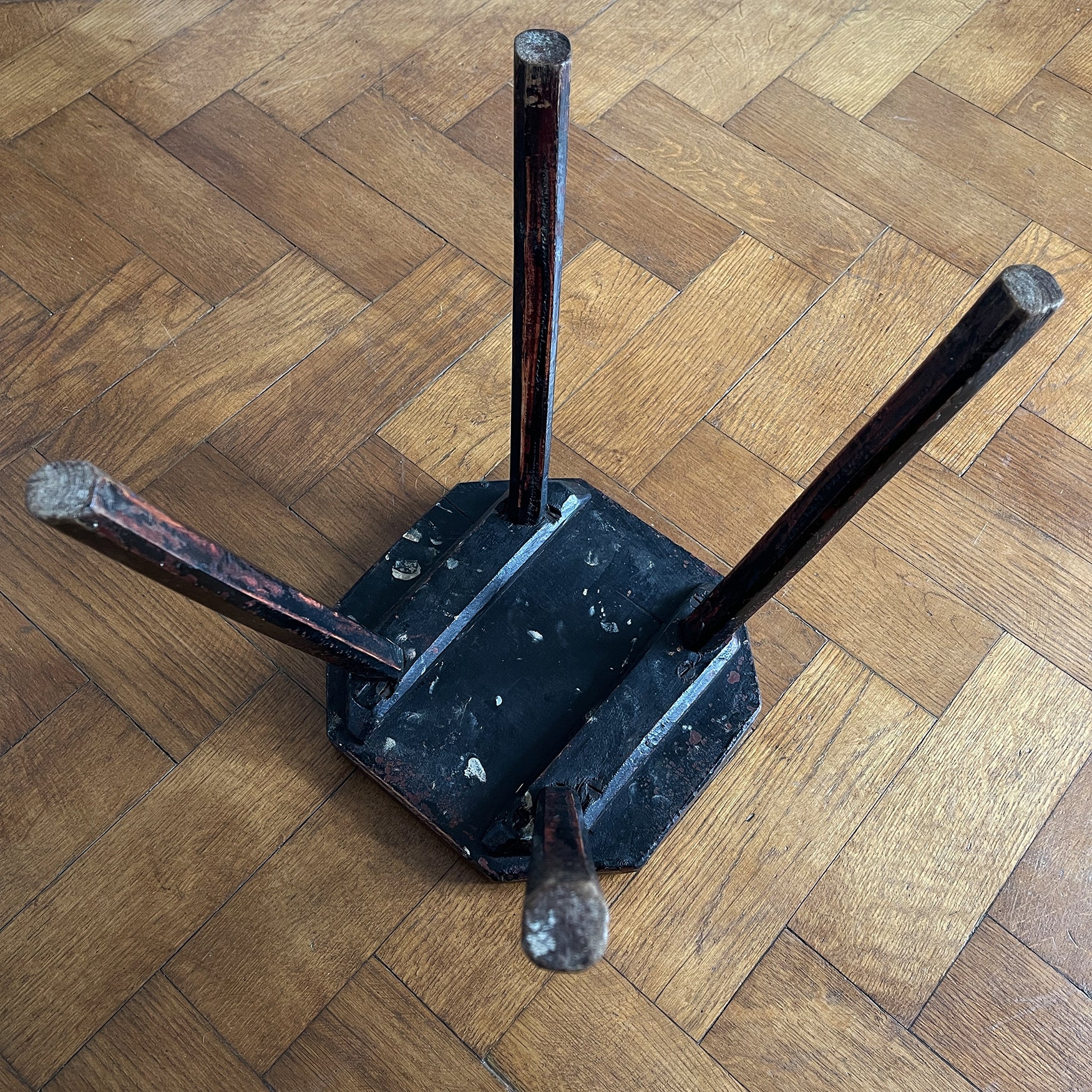 An Antique Elm Milking Stool with a wonder original black painted finish that has worn away over its years of use to provide the perfect finish. Very solid and sitting on four tapered straight edged legs -SHOP NOW - www.intovintage.co.uk