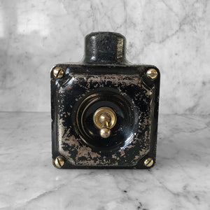 Metal Industrial Switch with a cast iron main body, pressed steel cover with brass toggle switch and brass cover screws with original finish. We have 3 of these switches in stock - SHOP NOW - www.intovintage.co.uk